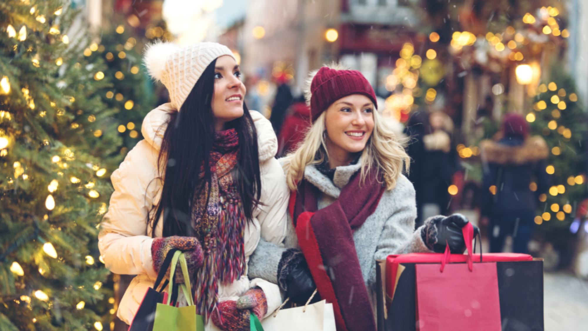 two women shopping during christmas