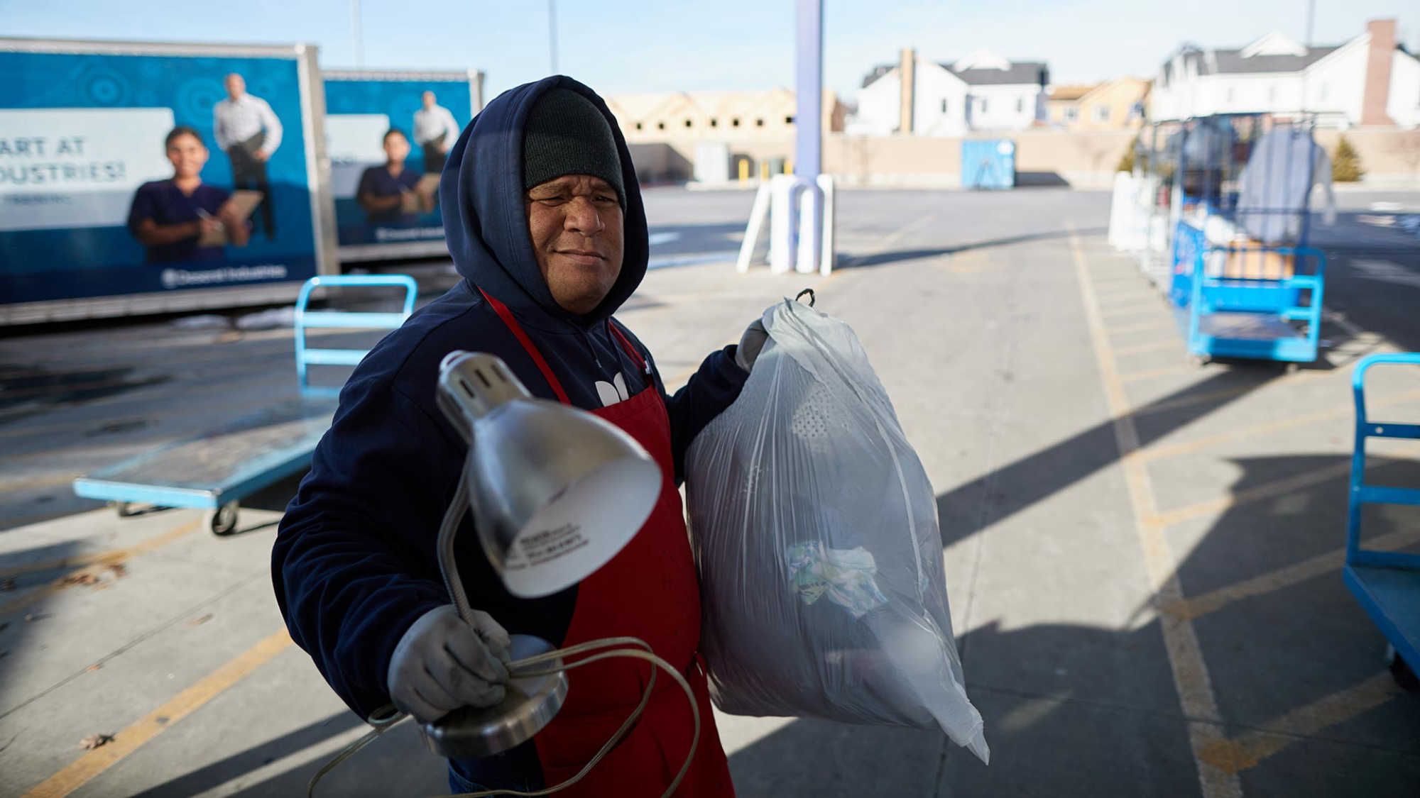 Associate Cohen collects donations at the DI donation bay